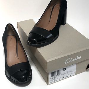 Cute Clarks pumps in patent, leather and suede combo.